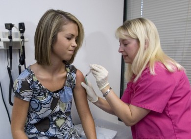 Lauren Fant getting her third and final application of the Human Papillomavirus (HPV) vaccine administered by nurse Stephanie Pearson.