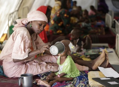 A mother feeds her malnourished child at a feeding centre run by Doctors Without Borders in Maiduguri, Nigeria.