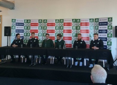 The new arrivals sitting with head coach Stephen Bradley and sporting director Stephen McPhail.