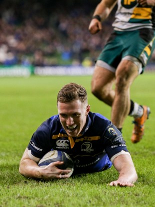 Rory O'Loughlin slides in Leinster's eighth of the night.