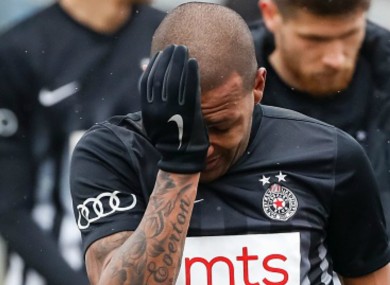 Everton Luiz reacts after being racially abused.