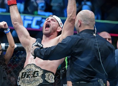 Stipe Miocic celebrates after last September's successful title defence against Alistair Overeem.