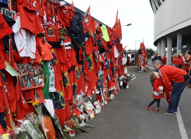 Munster fans pictured at a tribute wall to Anthony Foley at Thomond Park, Limerick.