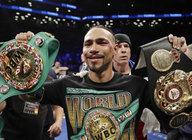 Thurman poses with his belts.