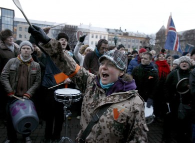 People protest in Reykjavik over the government's handling of the financial crisis.