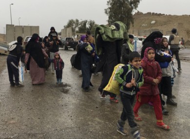 Civilians flee Mosul.