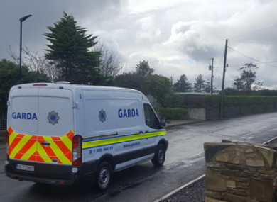 A garda van close to the murder scene.