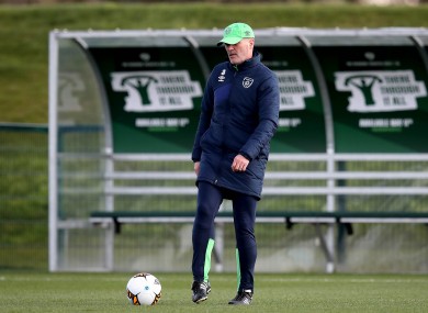 Keane kicks a ball during Ireland's training session.