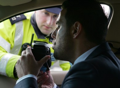 Garda David Maguire and posed model Mark Adams being tested for drink driving in order to raise awareness.