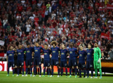 Manchester United players show their respects to the victims of the Manchester terror attack before the UEFA Europa League Final at the Friends Arena in Stockholm.