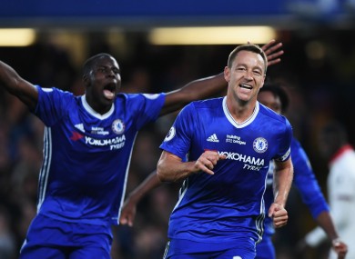 John Terry celebrates after handing Chelsea the lead against Watford