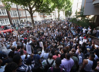 Protesters outside Kensington town hall in west London, the headquarters of the Royal Borough of Kensington and Chelsea,