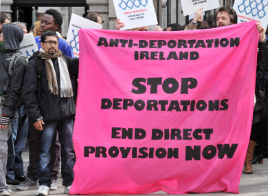 Protesters outside Leinster House calling for an end to the direct provision system.
