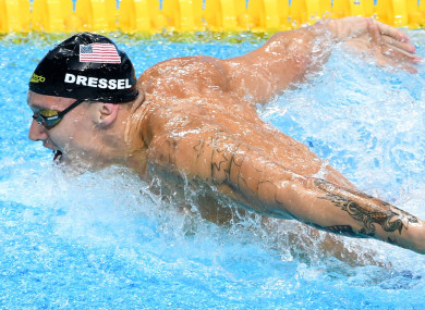 Dressel: won three golds in 98 minutes on Saturday night.
