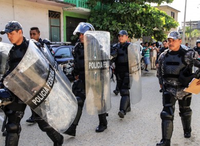 Armed police officers arrived as riot broke out