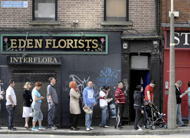 Members of the public queue outside the Social Welfare office in Bishop's Square in Dublin at the height of the crash in 2009.