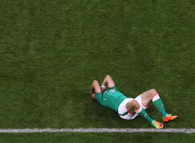 Ireland’s Shane Long shows his disappointment after the game.