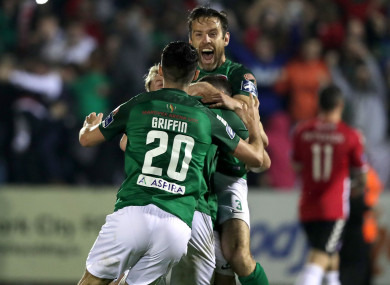 Cork City players including Alan Bennett and Shane Griffin celebrate after being crowned champions on Tuesday.