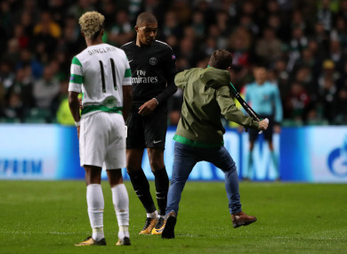 The young supporter runs towards Mbappe.