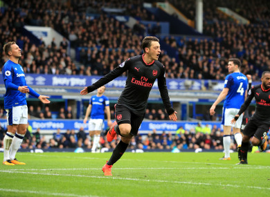 Ozil celebrates his goal.