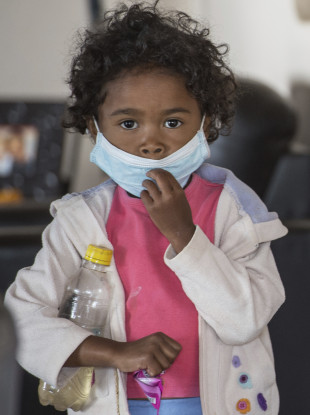 A child wears a face mask at a school in Antananarivo, Madagascar
