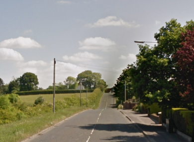The robbery occurred in a driveway on the Old Hillsborough Road in Lisburn.