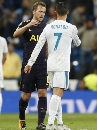 Kane with Cristiano Ronaldo after their recent Champions League meeting.
