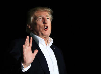 President Donald Trump speaks to reporters about Puerto Rico upon his return to the White House on Sunday.