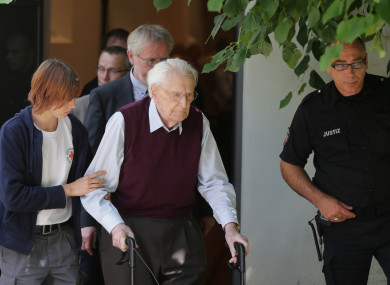 Former SS soldier Oskar Groening leaving court.