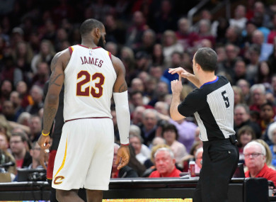 Referee Kane Fitzgerald ejects LeBron James during last night's game.