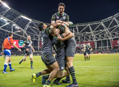 Ireland celebrate Jacob Stockdale's try.