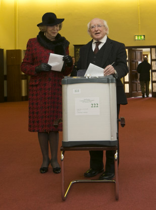 Sabina and President Michael D Higgins voting in 2016.