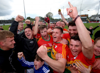 Carlow players celebrate after their win over Wexford.