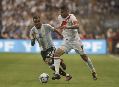 Paolo Guerrero in possession for Peru against Argentina.