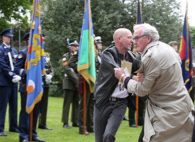 Canadian Ambassador Kevin Vickers tackling Brian Murphy at the event in 2016
