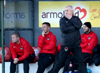 Cotter (left) in the dug-out with Liam Kearney and Caulfield.