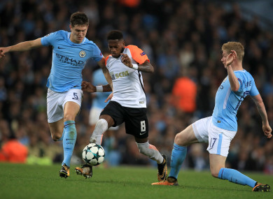 Fred facing John Stones and Kevin De Bruyne of Man City earlier this season.