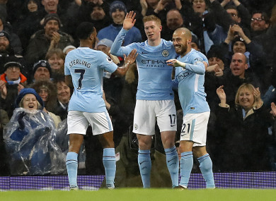 Manchester City's Raheem Sterling, Kevin De Bruyne and David Silva celebrate their second goal of the game.