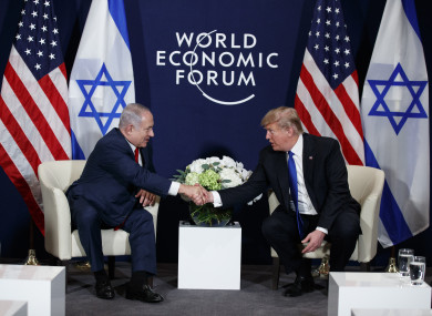 Trump shaking hands with Israeli Prime Minister Benjamin Netanyahu today in Davos.