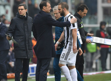 Higuain trudges off the pitch.