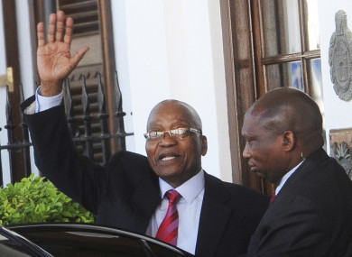 South African President Jacob Zuma waves as he leaves parliament in Cape Town (File photo).