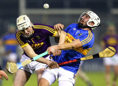 Tipperary's Patrick Maher in action against Wexford's Liam Ryan.