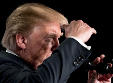 President Donald Trump looks out into the crowd as he speaks at the 2018 House and Senate Republican Member Conference yesterday.