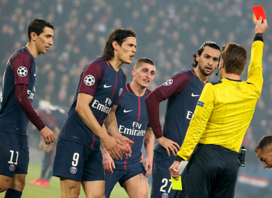 Marco Verratti of PSG receives a red card and is sent off by referee Felix Brych of Germany while Angel Di Maria, Edinson Cavani and Javier Pastore protest.