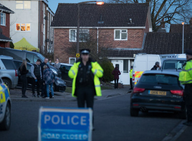 Police officers search the home of Sergei Skripal.