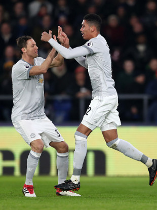 Nemanja Matic and Chris Smalling celebrate.
