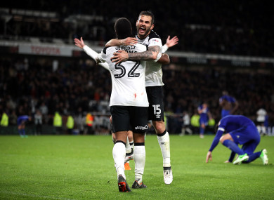 Derby County's Cameron Jerome (left) celebrates scoring his side's third goal with Bradley Johnson.