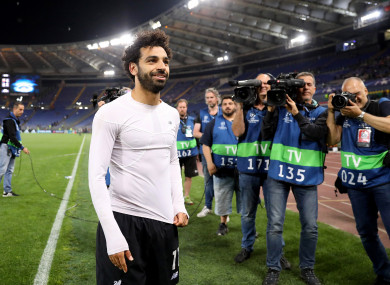 Liverpool's Mohamed Salah celebrates after the final whistle.