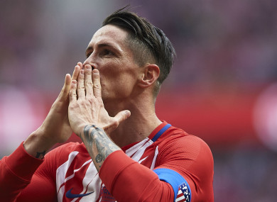 Fernando Torres blows kisses to the Atleti crowd.
