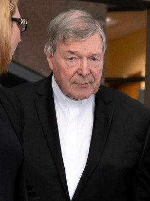Cardinal George Pell leaving Melbourne Magistrates' Court today